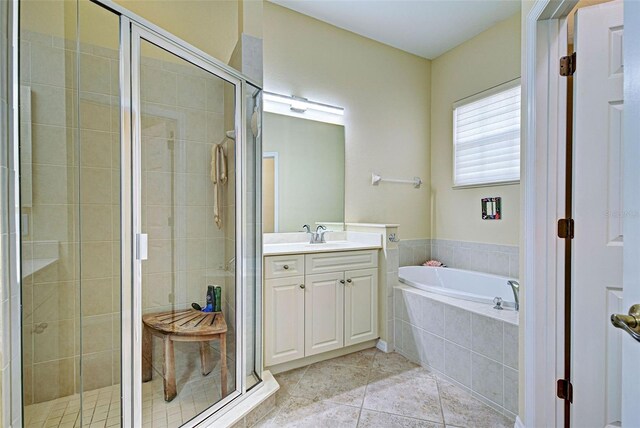 bathroom with vanity, separate shower and tub, and tile patterned floors