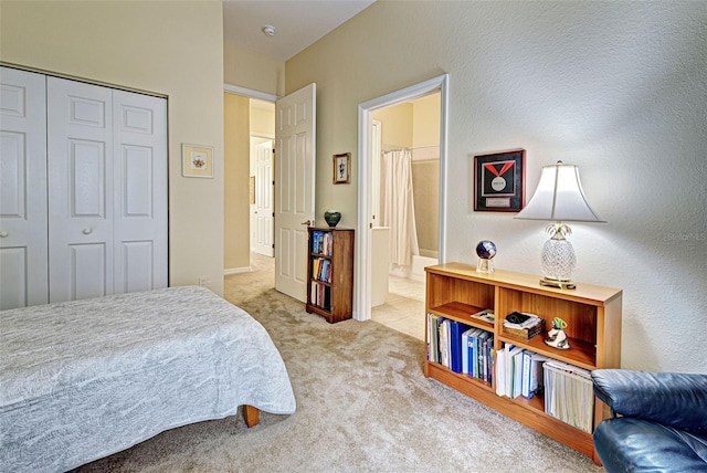 carpeted bedroom featuring a closet