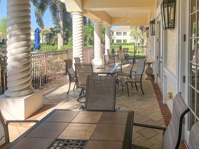 1704 Triano Cir Unit 1704, Venice, FL 34292 - view of patio / terrace with outdoor dining space and a ceiling fan