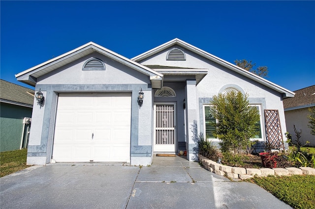 ranch-style house with a garage