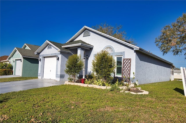 ranch-style home featuring a front yard and a garage