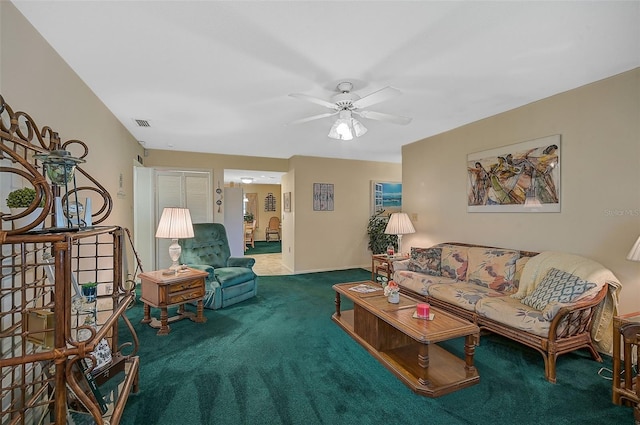 1402 Grand Blvd Unit 240, Sarasota, FL 34232 - living room featuring carpet flooring, a ceiling fan, and baseboards