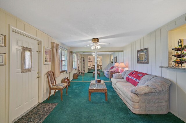 1402 Grand Blvd Unit 240, Sarasota, FL 34232 - living room featuring carpet and a ceiling fan