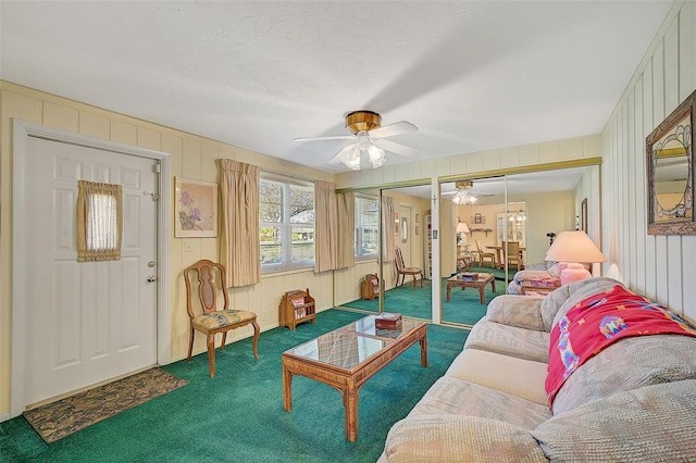 1402 Grand Blvd Unit 240, Sarasota, FL 34232 - living area featuring carpet and a ceiling fan