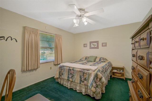 1402 Grand Blvd Unit 240, Sarasota, FL 34232 - bedroom with carpet, ceiling fan, and baseboards