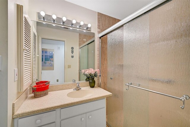 1402 Grand Blvd Unit 240, Sarasota, FL 34232 - full bathroom with a stall shower and vanity