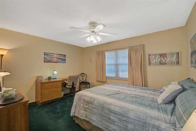 1402 Grand Blvd Unit 240, Sarasota, FL 34232 - bedroom featuring dark colored carpet, a ceiling fan, and an office area