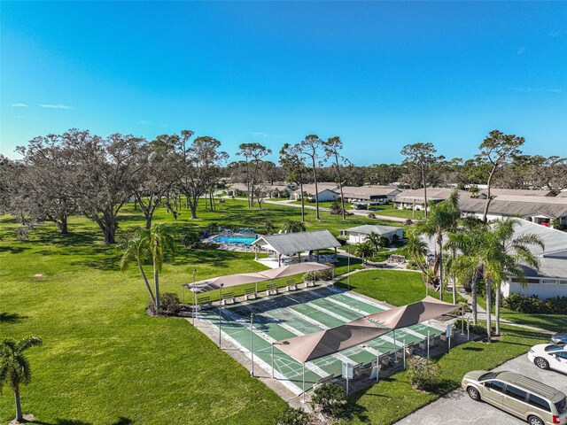 1402 Grand Blvd Unit 240, Sarasota, FL 34232 - view of home's community with shuffleboard, a lawn, and a residential view