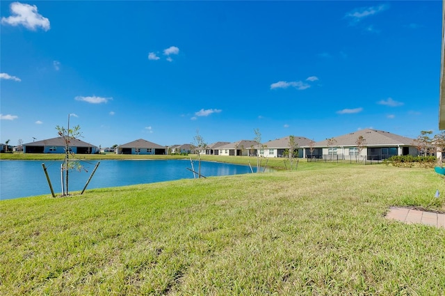 exterior space with a water view