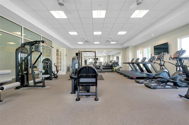 gym featuring a drop ceiling