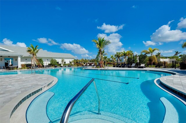 view of pool featuring a patio