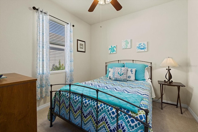 bedroom with multiple windows, carpet flooring, and ceiling fan