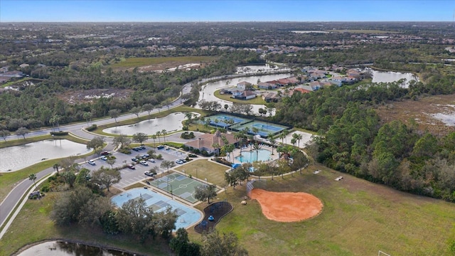 birds eye view of property with a water view