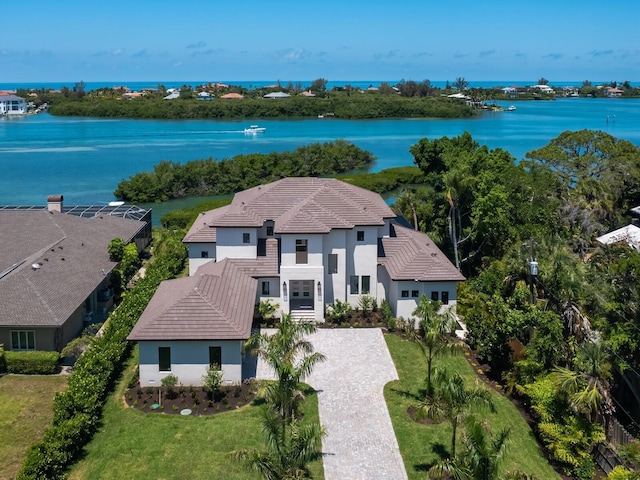 drone / aerial view with a water view