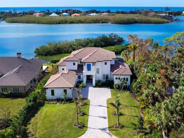 bird's eye view with a water view