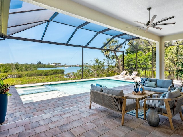 1109 Bayshore Rd, Nokomis, FL 34275 - outdoor pool with outdoor lounge area, a patio area, a water view, a ceiling fan, and a lanai