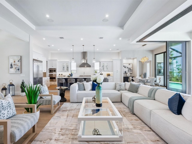 1109 Bayshore Rd, Nokomis, FL 34275 - living room featuring light wood-style floors and recessed lighting
