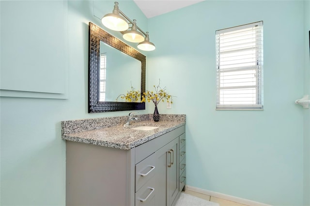 bathroom featuring vanity and tile patterned flooring