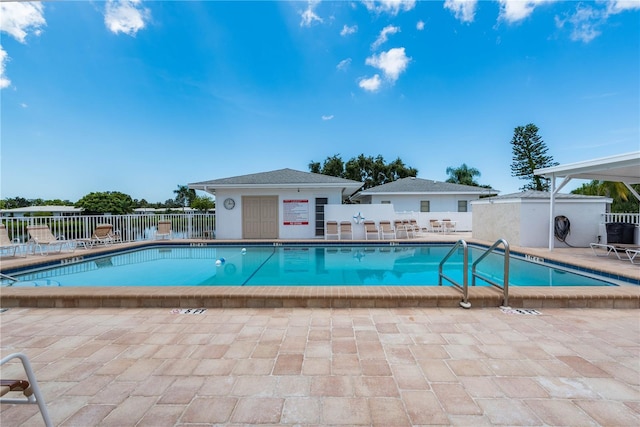 view of swimming pool featuring a patio