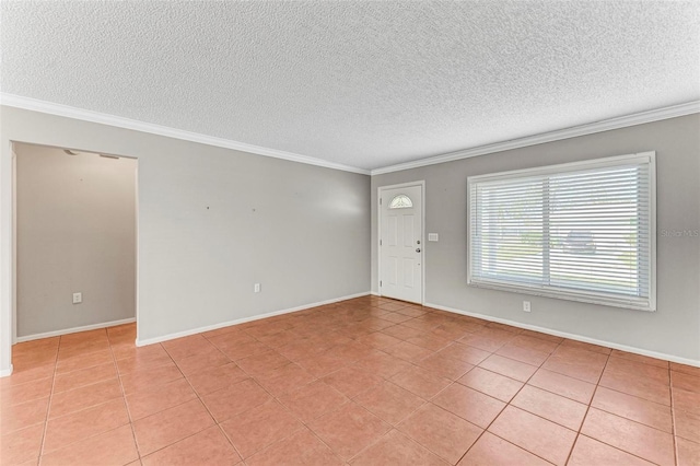 interior space featuring ornamental molding and a textured ceiling