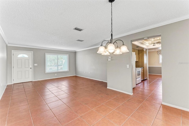 interior space with crown molding, a textured ceiling, and tile patterned flooring