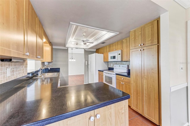 kitchen with backsplash, ornamental molding, decorative light fixtures, sink, and white appliances