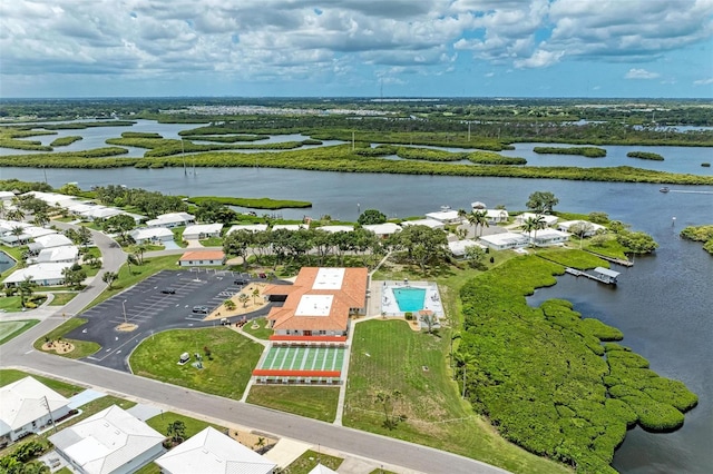 bird's eye view with a water view