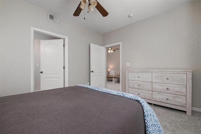 unfurnished bedroom featuring carpet floors and ceiling fan