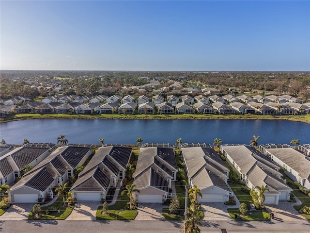 drone / aerial view with a water view