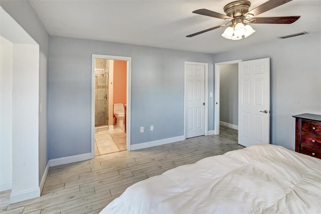 bedroom with connected bathroom, ceiling fan, and light hardwood / wood-style floors