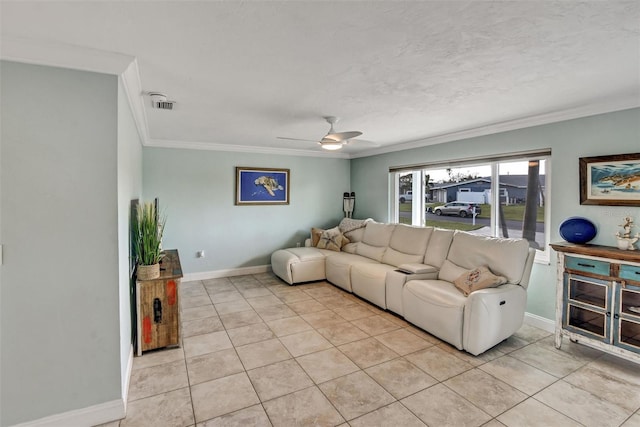 living room featuring light tile patterned floors, ceiling fan, and ornamental molding