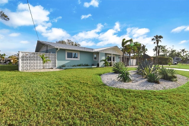 exterior space with a lawn