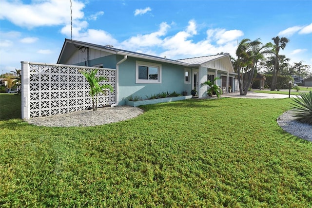 exterior space with a lawn