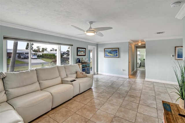 living room with ceiling fan, light tile patterned floors, and crown molding