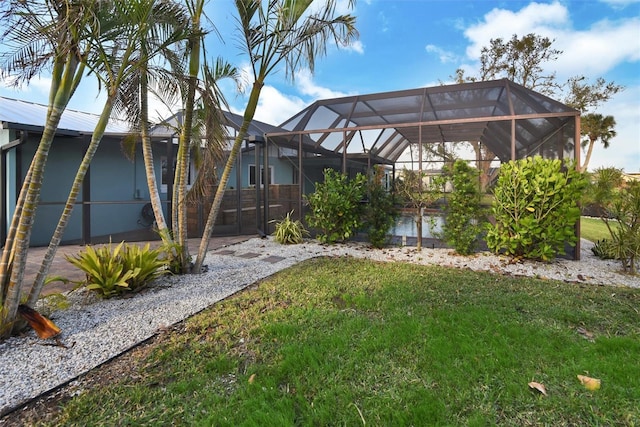 view of yard featuring a lanai