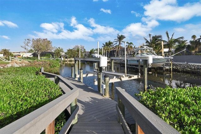 view of dock with a water view