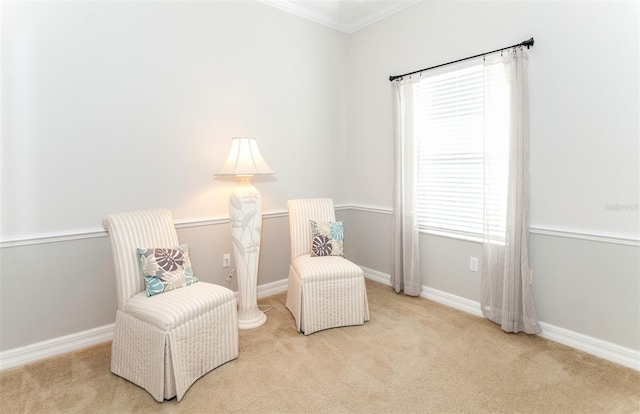 649 Crossfield Cir Unit 10, Venice, FL 34293 - sitting room featuring crown molding, carpet flooring, and baseboards