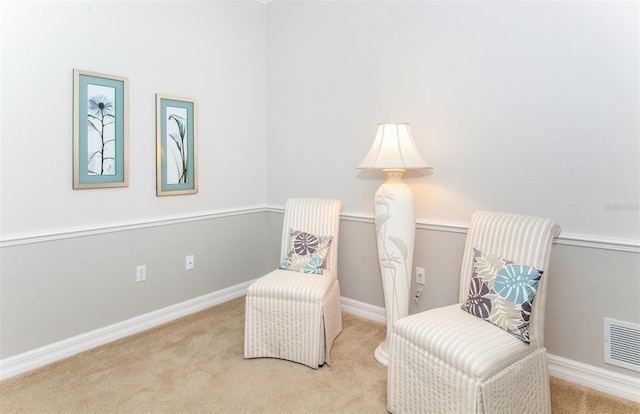 649 Crossfield Cir Unit 10, Venice, FL 34293 - sitting room featuring carpet floors and baseboards