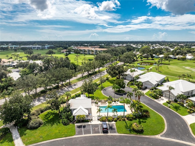 649 Crossfield Cir Unit 10, Venice, FL 34293 - aerial perspective of suburban area with a golf course, a nearby body of water, and a pool area