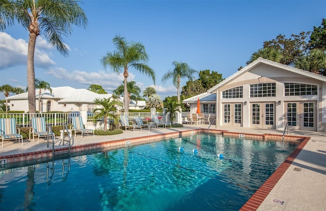 649 Crossfield Cir Unit 10, Venice, FL 34293 - community pool featuring french doors, fence, and a patio area
