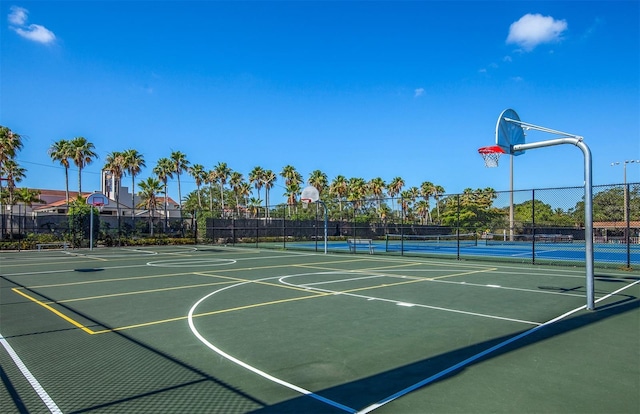 649 Crossfield Cir Unit 10, Venice, FL 34293 - view of sport court with community basketball court and fence