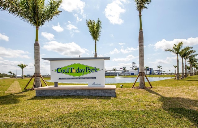 649 Crossfield Cir Unit 10, Venice, FL 34293 - community sign with a lawn and a water view