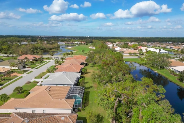 drone / aerial view featuring a water view