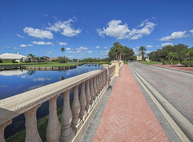 exterior space with a water view