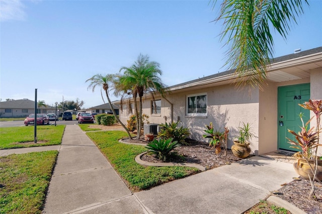 exterior space with a front lawn