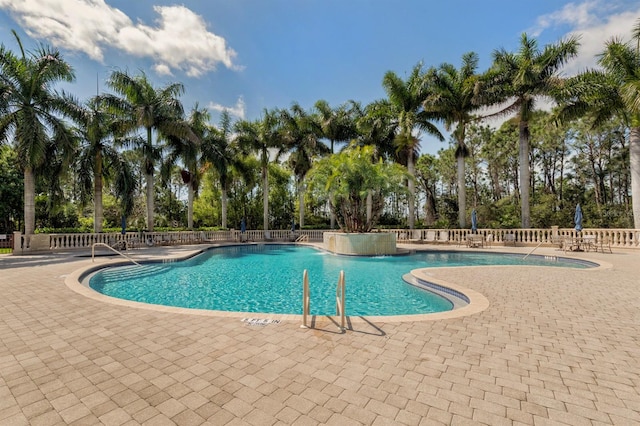 view of swimming pool featuring a patio