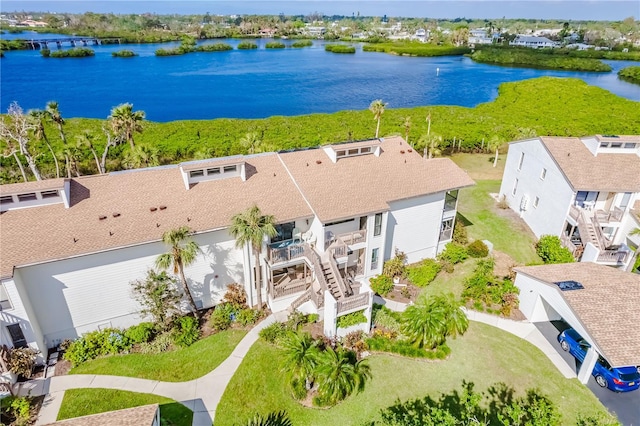 bird's eye view with a water view