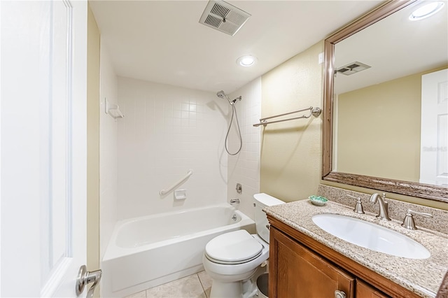 full bathroom featuring tile patterned flooring, vanity, toilet, and tiled shower / bath