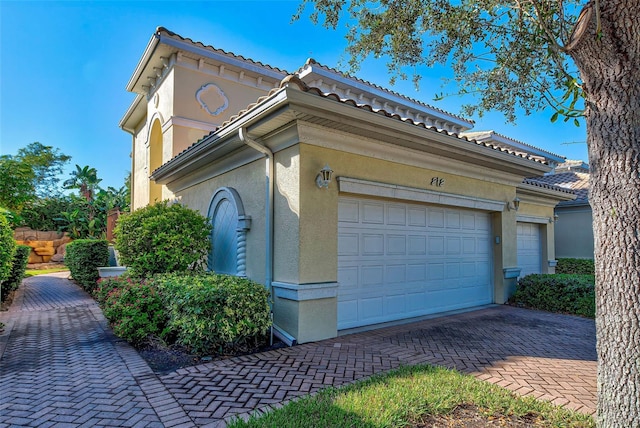 exterior space featuring a garage