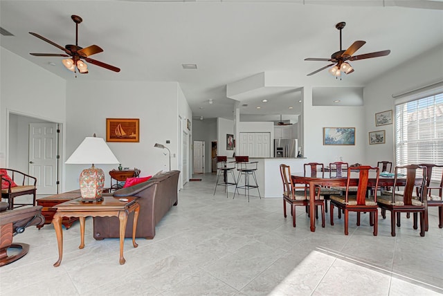 dining room featuring ceiling fan and light tile patterned floors